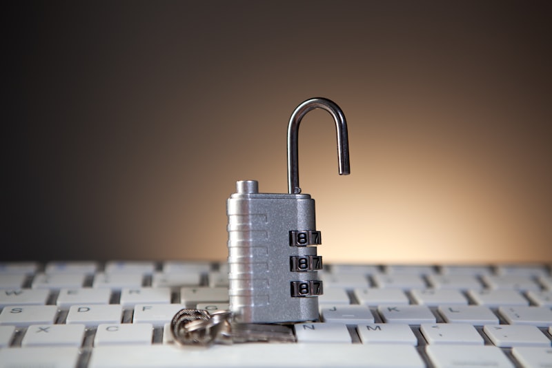 An open padlock on a keyboard, symbolizing disabled memory encryption