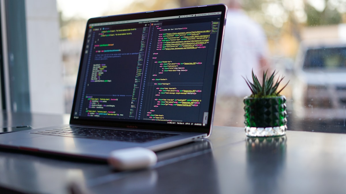 Developer's desk with a laptop displaying code — generic stock photo representing the best new AI tools of September 2026