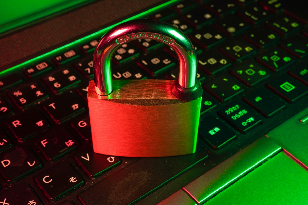 Padlock on a dark keyboard — generic stock photo symbolizing air-gapped, self-hosted AI security, not an actual depiction of Altar-1
