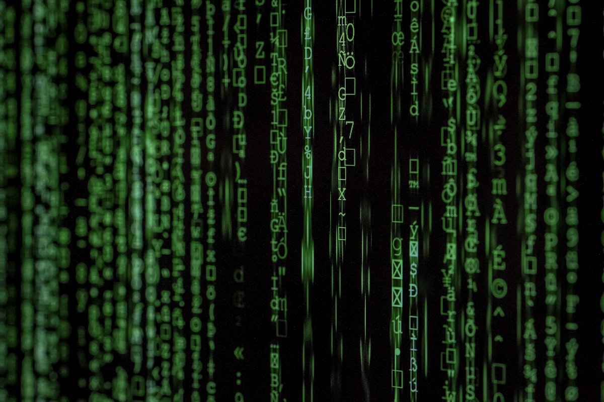 Stylized cascading green code — a generic security stock image, not an actual technical diagram of the symlink traversal
