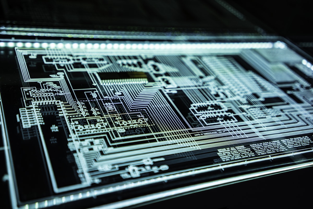 A glowing circuit schematic — a generic tech stock image, not a literal depiction of an AI agent reading poisoned documentation
