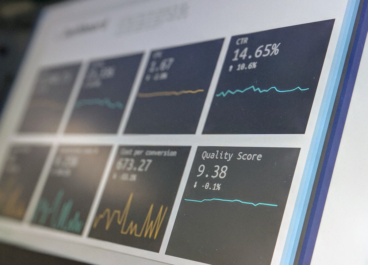 Stock photo of a blurred analytics dashboard with charts and metrics, used as an illustrative image for this section — not an actual OpenAI timeline graphic