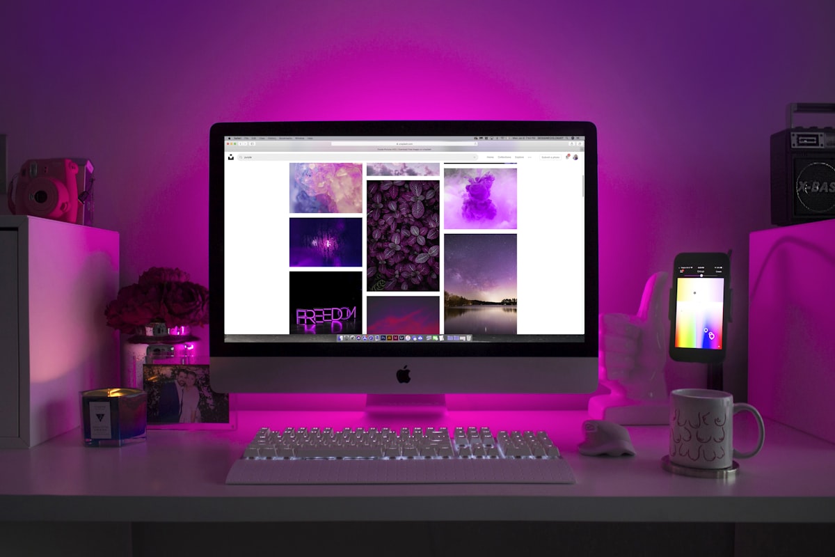 Project Zenith Microsoft Windows 11 dev PC — generic stock photo of a tidy, ready-to-use developer desk setup with a lit desktop computer, illustrating the ready-to-code Zenith experience rather than an actual Project Zenith device
